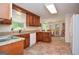 Kitchen with granite countertops, stainless appliances, and eat-in area at 830 Montego Sw Way, Lilburn, GA 30047