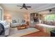 Spacious living room boasts hardwood floors, fireplace, and ample natural light, perfect for entertaining at 830 Montego Sw Way, Lilburn, GA 30047