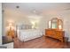 Spacious main bedroom with hardwood floors, windows, neutral colors, and ample closet space at 830 Montego Sw Way, Lilburn, GA 30047