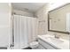 A clean, tiled bathroom with modern fixtures, large mirror, and a shower at 107 Corinth Reserve Pl, Grantville, GA 30220