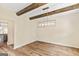 Dining room with modern lighting and hardwood floors at 107 Corinth Reserve Pl, Grantville, GA 30220