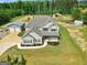 Stunning home with an attached garage and large private yard at 107 Corinth Reserve Pl, Grantville, GA 30220