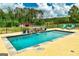 Beautiful backyard pool featuring stone trim and lovely views at 107 Corinth Reserve Pl, Grantville, GA 30220
