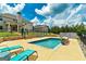 Wonderful pool and backyard view, perfect for lounging, entertaining, and enjoying the outdoors at 107 Corinth Reserve Pl, Grantville, GA 30220