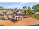 Enjoy the view from the deck furnished with outdoor dining and seating, plus patio umbrellas at 27 Lakes Edge Se Dr, Smyrna, GA 30080