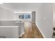 Spacious hallway with hardwood floors and natural light at 27 Lakes Edge Se Dr, Smyrna, GA 30080
