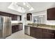 Well-lit kitchen features stainless steel appliances and granite counters at 27 Lakes Edge Se Dr, Smyrna, GA 30080