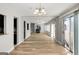 Open concept floor plan with hardwood floors at 27 Lakes Edge Se Dr, Smyrna, GA 30080
