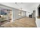 Spacious living room with sliding glass door and hardwood floors at 27 Lakes Edge Se Dr, Smyrna, GA 30080