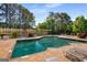 Community pool featuring a paved deck with lounge chairs for a resort-style experience at 27 Lakes Edge Se Dr, Smyrna, GA 30080