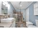 Stylish bathroom featuring tiled shower and spacious vanity at 701 Mask Rd, Brooks, GA 30205