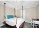 Charming bedroom featuring a unique hanging bed, neutral walls, and a complementary desk at 701 Mask Rd, Brooks, GA 30205