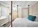 Bright bedroom with natural light, decorative pillows, and an accent wall at 701 Mask Rd, Brooks, GA 30205
