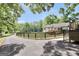Beautiful home exterior with a private driveway and surrounded by lush trees at 701 Mask Rd, Brooks, GA 30205
