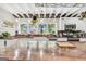Beautiful kitchen featuring granite countertops, a farmhouse sink, stone accents and lots of natural light at 701 Mask Rd, Brooks, GA 30205