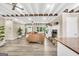 Inviting living room with a fireplace and exposed ceiling beams at 701 Mask Rd, Brooks, GA 30205