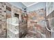 Tiled shower with glass block and dual shower heads at 701 Mask Rd, Brooks, GA 30205
