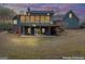 Beautiful home with a screened-in porch and wooden deck at 4186 Highway 138 Sw, Stockbridge, GA 30281