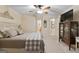 Comfortable bedroom with a ceiling fan, neutral colors, and a comfortable bed at 4186 Highway 138 Sw, Stockbridge, GA 30281