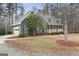 Charming home featuring a two-car garage and inviting front porch at 4186 Highway 138 Sw, Stockbridge, GA 30281