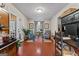 Inviting sitting room with brick floors, stylish decor, cozy seating, and plenty of natural light at 4186 Highway 138 Sw, Stockbridge, GA 30281