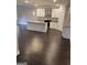 Modern kitchen with white cabinetry, granite countertops, and stainless steel appliances at 606 Gardner Rd, Stockbridge, GA 30281