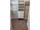 Bright walk-in closet featuring custom shelving and drawers for optimal storage and organization solutions at 606 Gardner Rd, Stockbridge, GA 30281