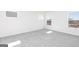 Bright room with neutral carpet and windows; ready for your personal touch and decor at 438 Prescott Way, Villa Rica, GA 30180