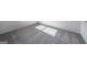 Close-up of grey carpet in room with window light on floor and white trim at 442 Prescott Way, Villa Rica, GA 30180
