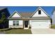 Charming home exterior with white siding, two-car garage, manicured lawn, and black front door with prominent house number at 442 Prescott Way, Villa Rica, GA 30180