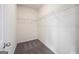 A small walk-in closet with carpet and a wire shelf at 442 Prescott Way, Villa Rica, GA 30180