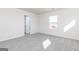 Bedroom filled with neutral carpet and a natural light filled window at 449 Prescott Way, Villa Rica, GA 30180