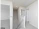 Upstairs hallway features neutral paint, carpet flooring, and leads to multiple rooms at 448 Prescott Way, Villa Rica, GA 30180