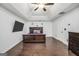 Spacious bedroom features trey ceilings, hardwood floors, and a stylish decorative headboard at 242 Greenland Dr, Mcdonough, GA 30253