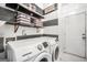 Efficient laundry area featuring modern front-load Samsung washer and dryer set at 242 Greenland Dr, Mcdonough, GA 30253