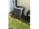 A modern A/C unit is featured in a grassy area next to a house with vinyl siding at 2353 Wellington Cir, Lithonia, GA 30058