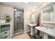 Elegant bathroom featuring dual vessel sinks, tiled shower, and modern fixtures for a luxurious experience at 1928 Main Nw St, Atlanta, GA 30318