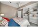 This bedroom features built-in shelving and direct access to an ensuite bathroom at 1928 Main Nw St, Atlanta, GA 30318