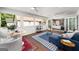 Bright sun room with comfortable seating and large windows providing scenic views and natural light at 1928 Main Nw St, Atlanta, GA 30318
