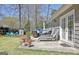 Inviting back patio with lounge chairs and outdoor seating, perfect for relaxing and entertaining at 200 Doe Run, Peachtree City, GA 30269