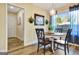 Inviting dining area featuring a round table, natural light, and stylish decor at 200 Doe Run, Peachtree City, GA 30269