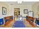 Dining room featuring a wooden dining table and chairs with an open floor plan at 200 Doe Run, Peachtree City, GA 30269