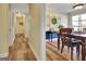 View of the dining room showing the table and chairs with hallway view in the background at 200 Doe Run, Peachtree City, GA 30269