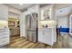 Open concept kitchen with stainless steel refrigerator and dining area at 200 Doe Run, Peachtree City, GA 30269