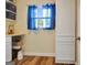 Functional storage room with ample shelving and natural light, perfect for organized storage solutions at 200 Doe Run, Peachtree City, GA 30269