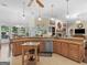 Spacious kitchen with granite countertops, stainless steel appliances, an island, and lots of cabinets at 1103 Wilder Ct, Mcdonough, GA 30252