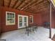Outdoor patio with brick wall, furniture set, and BBQ grill, perfect for entertaining at 1103 Wilder Ct, Mcdonough, GA 30252