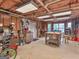 Spacious workshop with workbench, storage cabinets, and ample lighting for hobbies and projects at 1103 Wilder Ct, Mcdonough, GA 30252