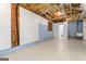 Unfinished basement area with exposed ceiling, utilities, and painted walls at 375 Oakpark Ter, Mcdonough, GA 30253