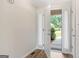 Welcoming entryway with wood flooring and view of the front yard at 375 Oakpark Ter, Mcdonough, GA 30253